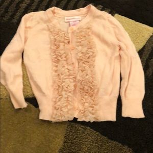 Peach colored baby cardigan with ruffles. Size 18m
